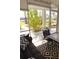 Relaxing lanai with table, chairs, and sofa at 2164 Vista Del Sol Cir # 505, Lutz, FL 33558