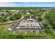 Aerial view of community center, tennis, pickleball courts at 2263 Whisper Walk Dr, Spring Hill, FL 34606