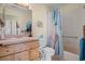 Bathroom with wooden vanity and walk-in shower at 2263 Whisper Walk Dr, Spring Hill, FL 34606