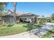 Community building with landscaping and walkway at 2263 Whisper Walk Dr, Spring Hill, FL 34606