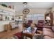 Spacious living room with comfortable seating and plenty of natural light at 2263 Whisper Walk Dr, Spring Hill, FL 34606