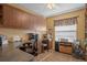Home office with built-in desk and cabinets at 2263 Whisper Walk Dr, Spring Hill, FL 34606