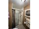 Full bathroom with shower, decorative towels and vanity with cabinet at 30 Turner St # 208, Clearwater, FL 33756