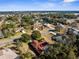 A birds eye view of a residential neighborhood with lush greenery and spacious homes at 397 Silas Ct, Spring Hill, FL 34609