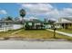 Charming single-story home with green trim and well-maintained lawn at 5648 Riverview Dr, New Port Richey, FL 34652