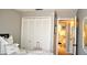 Bedroom with bed, closet, and ensuite bathroom at 6124 Chesham Dr # 6, New Port Richey, FL 34653