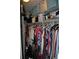 Well-organized closet with clothing and shelves at 6124 Chesham Dr # 6, New Port Richey, FL 34653