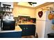 Fully equipped kitchen featuring updated cabinets and countertops at 6124 Chesham Dr # 6, New Port Richey, FL 34653