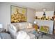 Spacious living room featuring a comfy sectional sofa and large statement art at 6124 Chesham Dr # 6, New Port Richey, FL 34653
