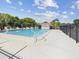 Inviting community pool with ample deck space at 6124 Chesham Dr # 6, New Port Richey, FL 34653
