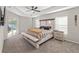 Spacious main bedroom boasts natural light, neutral decor, and outdoor access at 7482 Winter St, Brooksville, FL 34613