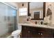 Updated bathroom with granite vanity and glass shower at 7489 Gates Cir, Spring Hill, FL 34606