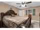 Large main bedroom with a king-size bed and ceiling fan at 7489 Gates Cir, Spring Hill, FL 34606