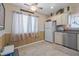 Bright kitchen features stainless steel appliances, granite countertops, and tile flooring at 8194 Sturbridge Ct # A, Weeki Wachee, FL 34613
