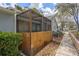 Enclosed patio with wood fence, providing privacy, and a space for outdoor enjoyment at 8194 Sturbridge Ct # A, Weeki Wachee, FL 34613