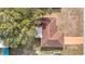 Birds-eye-view showcases the roof of this charming home and surrounding lot and street at 8464 Dirlenton Way, Weeki Wachee, FL 34613