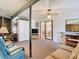 Spacious sunroom that opens to another room via sliding glass doors at 8464 Dirlenton Way, Weeki Wachee, FL 34613