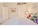 Bedroom featuring neutral carpet, paint, a bed with soft linens, and ample storage space at 9091 Alexandria Dr, Weeki Wachee, FL 34613