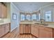 Kitchen area with view to the breakfast nook provides everything a chef needs in this cozy home at 9091 Alexandria Dr, Weeki Wachee, FL 34613