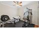 Home gym featuring weight training equipment and rubber flooring at 18819 Sunterra Dr, Land O Lakes, FL 34638