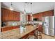 Kitchen with a large island and stainless steel appliances at 18819 Sunterra Dr, Land O Lakes, FL 34638