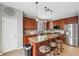 Kitchen with a large island, stainless steel appliances, and granite counters at 18819 Sunterra Dr, Land O Lakes, FL 34638