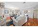 Bright living room with hardwood floors and contemporary decor at 18819 Sunterra Dr, Land O Lakes, FL 34638