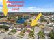 Aerial view of the neighborhood showing the playground and basketball court at 18819 Sunterra Dr, Land O Lakes, FL 34638