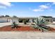 Charming single story home with well-maintained front yard landscaping and a two car garage at 10841 Piccadilly Rd, Port Richey, FL 34668