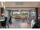 Bright living room flows into a cozy screened-in lanai with beautiful outdoor views at 11008 Torrey Pines Ct, Hudson, FL 34667