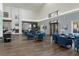 Inviting resident lounge featuring high ceilings and modern decor, perfect for relaxation and community gatherings at 11008 Torrey Pines Ct, Hudson, FL 34667