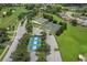 Aerial view of community tennis courts, pickleball courts, and landscaped grounds at 11008 Torrey Pines Ct, Hudson, FL 34667