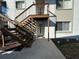 Inviting condo front entrance with stairs, garden and stylish exterior lighting at 12408 Eagleswood Dr # B, Hudson, FL 34667