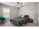 Bedroom featuring neutral walls, carpet, and a large window at 13357 Marble Sands Ct, Hudson, FL 34669