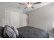Bedroom with neutral walls, carpet, and a large closet at 13357 Marble Sands Ct, Hudson, FL 34669