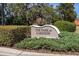 Attractive 'The Park at Lakeside' entrance sign with well-maintained greenery at 13357 Marble Sands Ct, Hudson, FL 34669