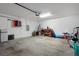 Spacious garage with tools, storage, and bike, offering ample room for parking and hobbies at 13357 Marble Sands Ct, Hudson, FL 34669