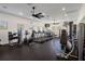 The community gym features modern exercise equipment including treadmills, bikes, weight machines, and free weights at 13357 Marble Sands Ct, Hudson, FL 34669