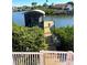 Waterfront home's private dock with a boat lift, offering direct access to the water at 1421 Apollo Beach Blvd, Apollo Beach, FL 33572