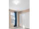 Neutral bedroom with a window and closet at 1442 Lenton Rose Ct, Trinity, FL 34655