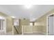 Upstairs hallway featuring carpet and doorways into bedrooms and the main stairwell at 1442 Lenton Rose Ct, Trinity, FL 34655