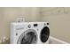 Laundry room with modern appliances at 1442 Lenton Rose Ct, Trinity, FL 34655