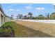 Expansive backyard with lush landscaping providing a serene and private outdoor oasis at 14421 Nonna Sky Drive Dr, Spring Hill, FL 34609