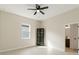 An empty bedroom featuring tiled floors and an in-room bar at 14421 Nonna Sky Drive Dr, Spring Hill, FL 34609