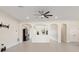 Open living room featuring recessed lighting, tile floors and arched entries at 14421 Nonna Sky Drive Dr, Spring Hill, FL 34609