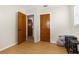Spacious room with wood floors, providing versatility for various uses at 1709 W Dempsey Ave, Tampa, FL 33603
