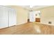 Large bedroom with a walk-in closet and a view to the bathroom at 3038 Eastland Blvd # F103, Clearwater, FL 33761
