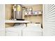 Washer, dryer, and water heater in a dedicated laundry room at 3038 Eastland Blvd # F103, Clearwater, FL 33761