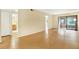 Bright living room with an entrance to the bathroom and balcony at 3038 Eastland Blvd # F103, Clearwater, FL 33761