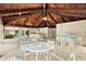 Covered pavilion with dining tables and ceiling fans, perfect for outdoor gatherings at 3038 Eastland Blvd # F103, Clearwater, FL 33761